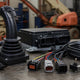 Generic lift joystick controller with connectors and control parts on a workbench